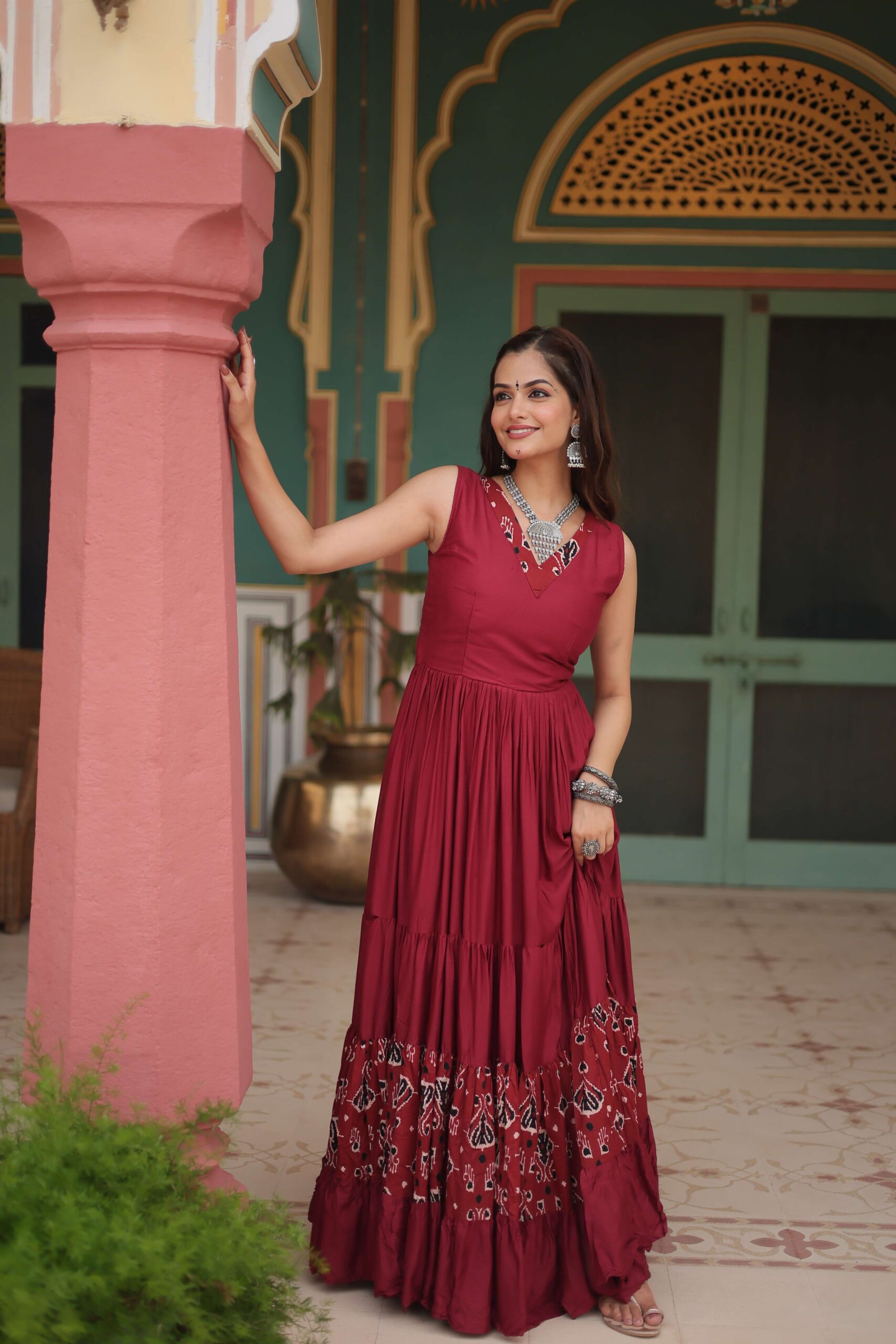 Maroon Designer Heavy Reyon Gown with Printed Frill & Fancy V-Neck - Image 4